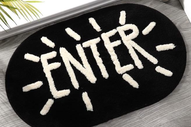 Oval letter absorbent door mat (1)